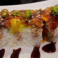 Dragon Roll · Shrimp tempura, spicy tuna, comes with unagi.