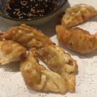 Gyoza Dumpling · Deep-fried beef and vegetable dumpling. (6 pieces)