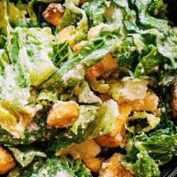 Caesar Salad
 · Green leaf lettuce, croutons, Parmesan cheese served with Caesar dressing.