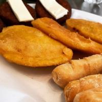 Mi Pana Appetizer · With three empanadas, three mandoca and three tequeños.