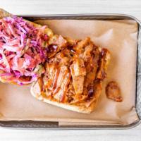 Brisket Sandwich · Our famous homemade seitan, barbecue sauce and coleslaw served on ciabatta. . BBQ Sauce: Con...