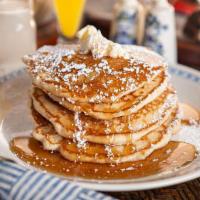 Flapjack Pancakes · 4 griddle buttermilk pancakes with syrup, butter and powdered sugar with your choice of pres...