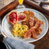 Classic Breakfast Plate · 2 eggs, hash browns, bacon or sausage, toast