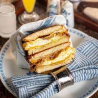 801 Breakfast Sandwich · gruyere, cheddar, egg, aioli, grilled sweet onion, rosemary, scrambled eggs, rustic sourdough