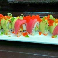 Tuna Lover Roll · Spicy. Inside spicy tuna and cucumber. Outside tuna, avocado, green onion, and tobiko.