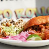 Combinación · Half of torta ahogada or lonche and two potatoes tacos with lettuce, salsa carnitas and coti...