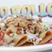 Tacos De Papa (3) · Corn tortilla, potatoes, lettuce, sheet tomato sauce, pork meat sprinkled on top, parmesan c...