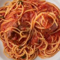 Spaghetti Con Meatballs · Pasta with tomato sauce, fresh basil and homemade meatballs.