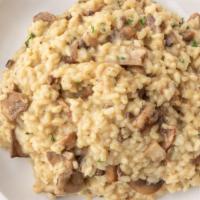 Risotto Al Funghi · Arborio rice with fresh mushrooms, porcini mushrooms, parmesan cheese and vegetable broth.