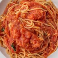 Spaghetti Al Pomodoro · Pasta with fresh chopped tomatoes, garlic, fresh basil and olive oil.