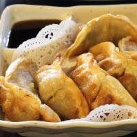 Beef Gyoza (5 Pieces) · Fried dumpling with soy vinegar sauce.