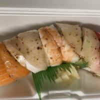Rainbow Roll · In: imitation crabmeat, avocado, cucumber. Out: seaweed, tuna, salmon, albacore, shrimp, avo...