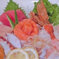 Deluxe Sashimi · 15pcs. 
3 tuna, 2 salmon, 2 yellowtail, 2 albacore, 2 white fish,
2 octopus, 1 sweet shrimp,...