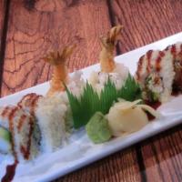 Crunchy · Imitation crab, avocado, shrimp tempura, with tempura crumbs and eel sauce on top.
