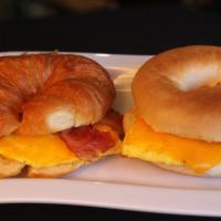 Bacon, Egg & Cheddar Croissant · Crisp bacon, fluffy eggs, melted cheddar on a flaky croissant.
