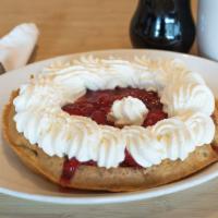 Strawberry Or Blueberry Waffle · Topped with strawberries or blueberries and whipped cream.