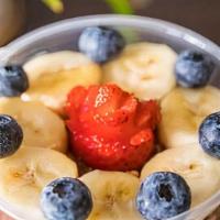 Açaí Bowl · Organic Acai blended to order with banana and strawberries, topped with granola and fresh fr...