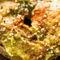 Avocado Bagel · Everything Bagel topped with cream cheese, avocado and spices