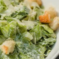 Caesar Salad · Romaine, shaved Parmesan, croutons and homemade Caesar dressing.