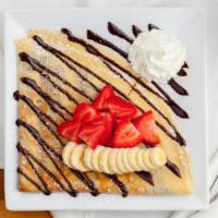 Nutella Crepe · Nutella, strawberries, bananas in a freshly hand crafted crepe