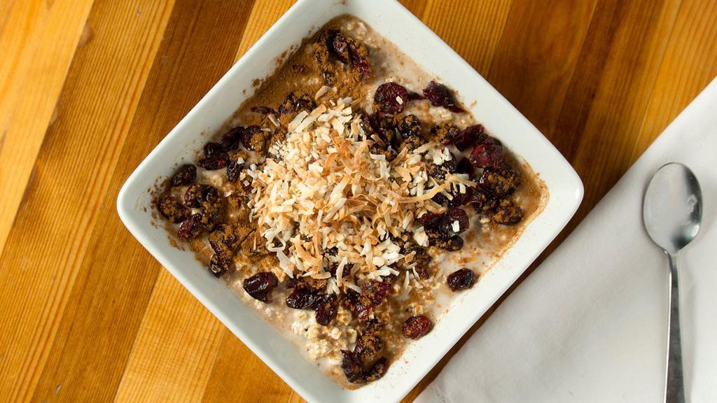 Overnight Oats · With Coconut Milk, Cranberries, Cinnamon and Toasted Coconut Flakes
