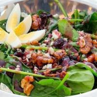 Spinach + Gorgonzola Salad · spinach, gorgonzola, bacon, egg, dried cranberries, walnuts, raspberry vinaigrette dressing ...