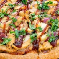 Bbq Chicken Pizza · bbq sauce, shredded mozzarella, pineapple, red onions, fire braised chicken, finished with b...