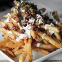 Bacon Ranch Fries · Topped with Ranch, Bacon, and Parsley. 545 cal.