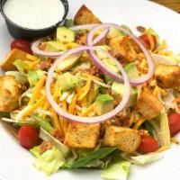 Joe'S Garden Salad · Lettuce, bacon, avocado, tomato, red onion, cheese, house made croutons, with choice of dres...