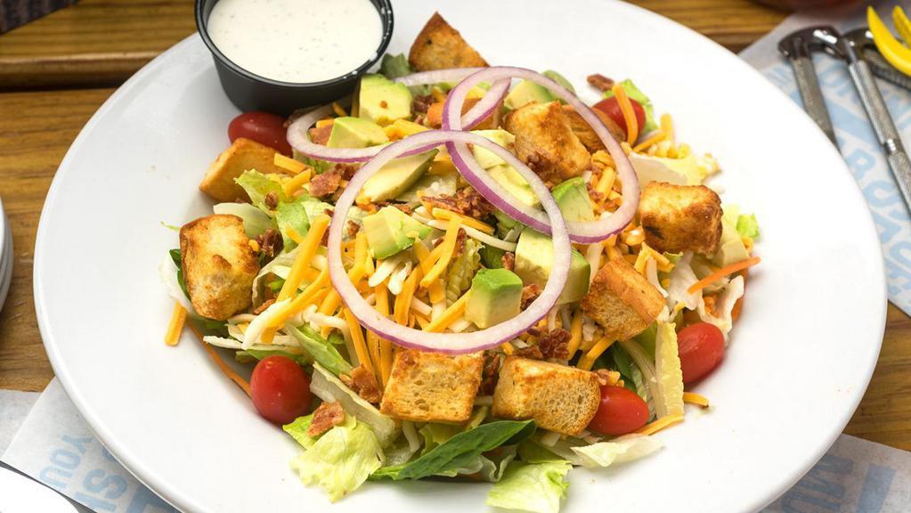 Joe'S Garden Salad · Lettuce, bacon, avocado, tomato, red onion, cheese, house made croutons, with choice of dressing.