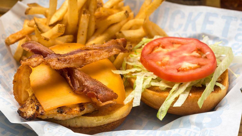 Chicken Sandwich · Grilled chicken breast, cheddar cheese, lettuce, tomato and smoked bacon.