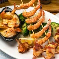 Shrimp Sampler · Bacon-wrapped shrimp filled with seafood stuffing, cheese and jalapeños, grilled shrimp, shr...