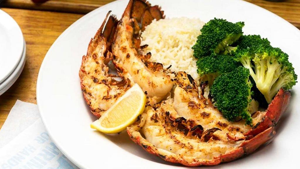 Lobster Tails · Lobster tails, with white rice and seasonal vegetables.