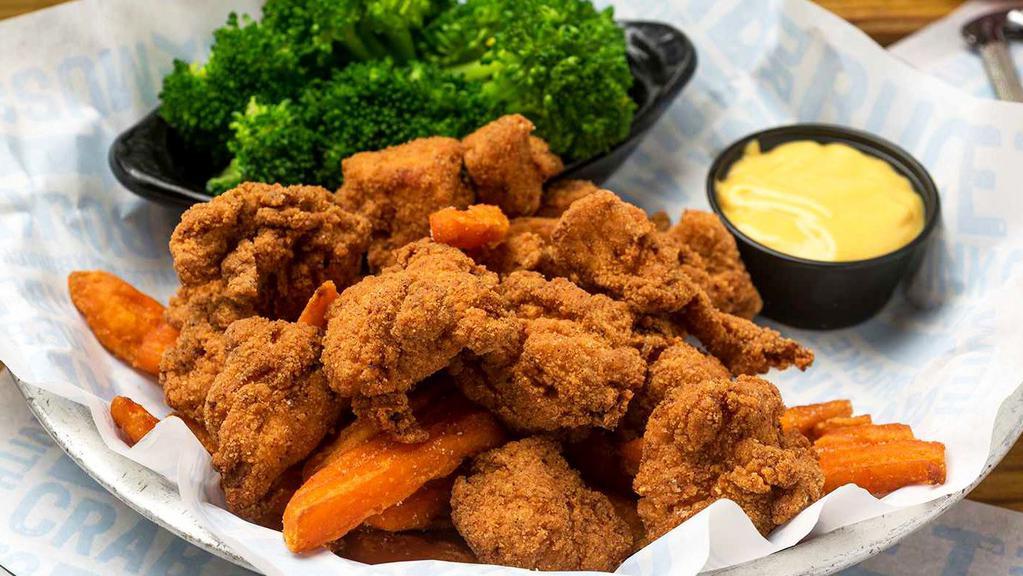 Chicken Tenders · Hand breaded white meat chicken. Served with fries, coleslaw and hush puppies.