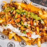 Fries W/ Meat · Fries topped with your Choice of Meat, Melted cheese, Sour Cream, and Guacamole.