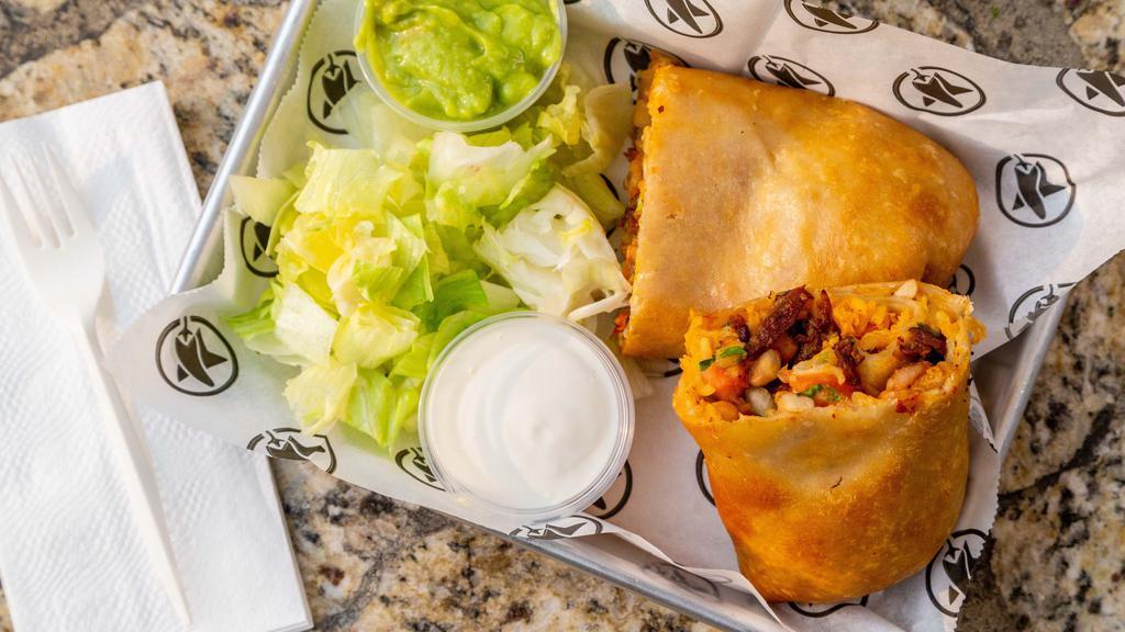 Chimichanga · Deep Fried Flour Tortilla, meat, cheese, rice, beans, pico de gallo, cilantro, onions, salsa