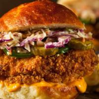 The Hot Chicken Sandwich · Hot! Chicken sandwich made with brioche bun filled with crunchy tenderloin chicken breast, c...