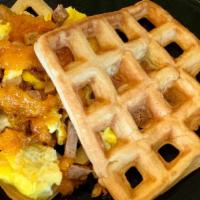 Waffle Egg Sandwich · Scrambled eggs and  turkey sausage piled on two large waffles topped with cheddar cheese. Se...