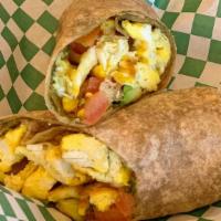 Anytime Cali · Avocado, scrambled eggs, tomatoes and basil pesto wrapped in a flour tortilla.