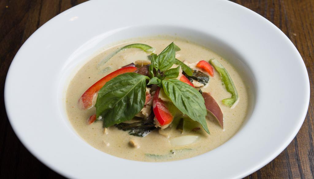 Green Curry · Green curry paste, coconut milk, bamboo shoot, eggplant, bell pepper, fresh basil and kaffir lime leaves. Served with rice. Spicy.