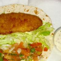 Fish Taco · Breaded or grilled fish onions, cilantro, salsa and lettuce.