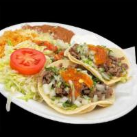 2 Taco Dinner · 2 soft tacos with your choice of meat. Sided with rice, beans, salsa, lettuce, guacamole, an...