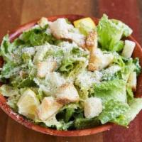 Little Gem Caesar Salad · Comes with croutons, roasted garlic, and shaved Parmesan.