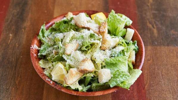 Little Gem Caesar Salad · Comes with croutons, roasted garlic, and shaved Parmesan.