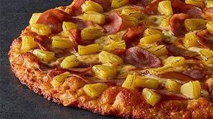 Hawaiian · Island style pizza tender ham & juicy pineapple on zesty red sauce.