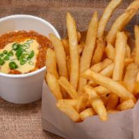 Chili Cheese Fries · Haus chili, cheese & topped with green onions. Reheat chili & cheese just prior to serving, ...