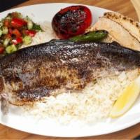 #17B Bonless Idaho Trout · Whole Rainbow Trout - Served with Rice, Pita Bread, Shirazi Salad, Grilled Tomatoes and Pepp...