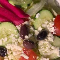 Greek Salad · Lettuce, Tomatoes, Cucumber, Greek Feta Cheese and Olives served with our house made dressin...