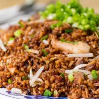 House Fried Rice · Includes chicken, pork and shrimp.