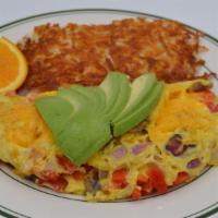 House Omelet · 3 egg omelet made with mushrooms, tomato, red onion, red bell peppers, and topped with avoca...